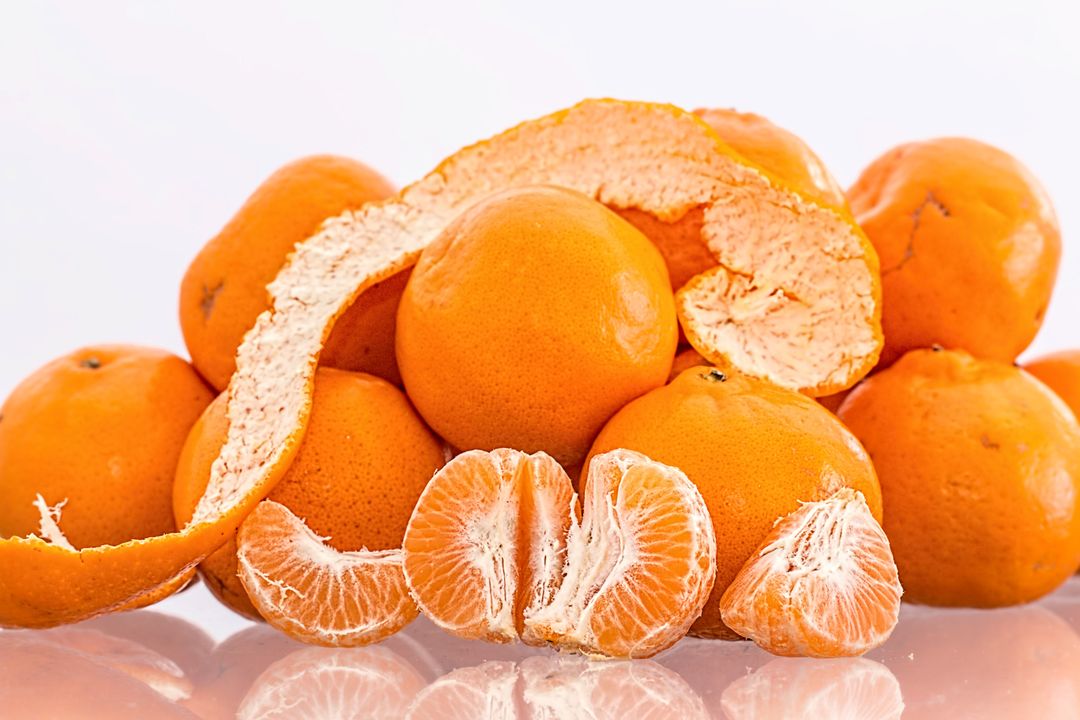 Fresh oranges with peel and juicy segments - Free Images, Stock Photos and Pictures on Pikwizard.com