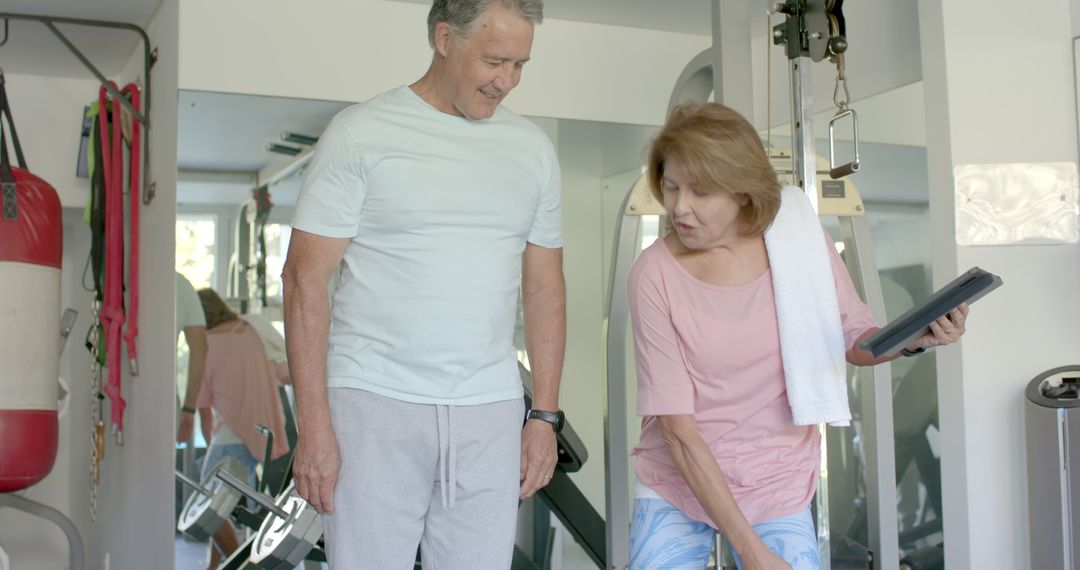 Senior Couple Enjoying Fitness Routine in Home Gym