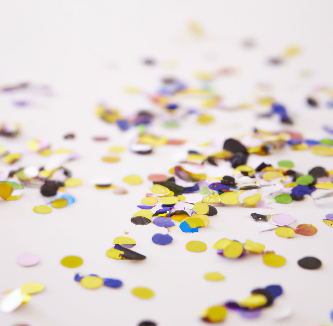 Colorful Confetti Scattered on White Background Close-up - Free Images, Stock Photos and Pictures on Pikwizard.com