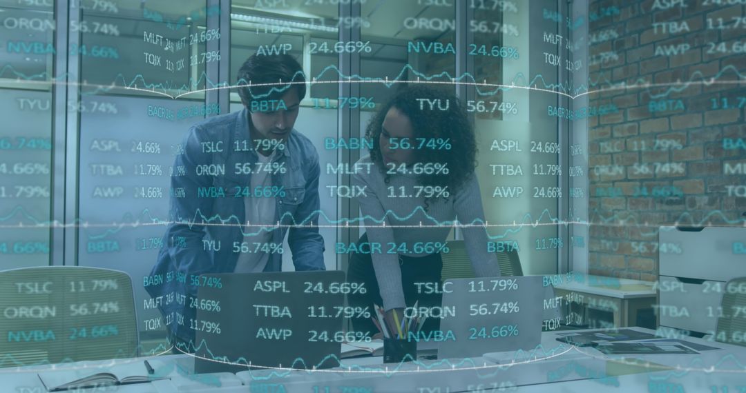 Colleagues Collaborating on Financial Solutions in Modern Office