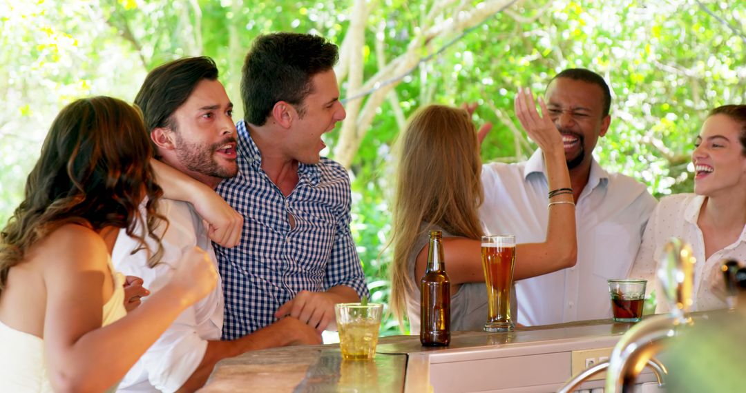 Friends Enjoying in Outdoor Bar with Drinks and Laughter - Free Images, Stock Photos and Pictures on Pikwizard.com