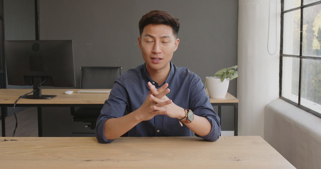 Businessman Discussing Ideas in Modern Office Setting