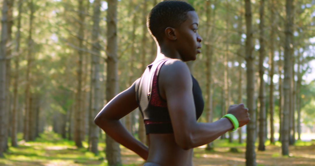 Young African American Woman Jogging in Forest - Free Images, Stock Photos and Pictures on Pikwizard.com