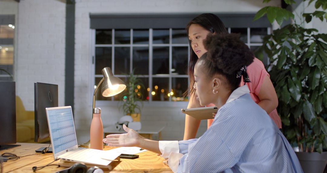 Collaborative Teamwork in Modern Office with Diverse Professionals