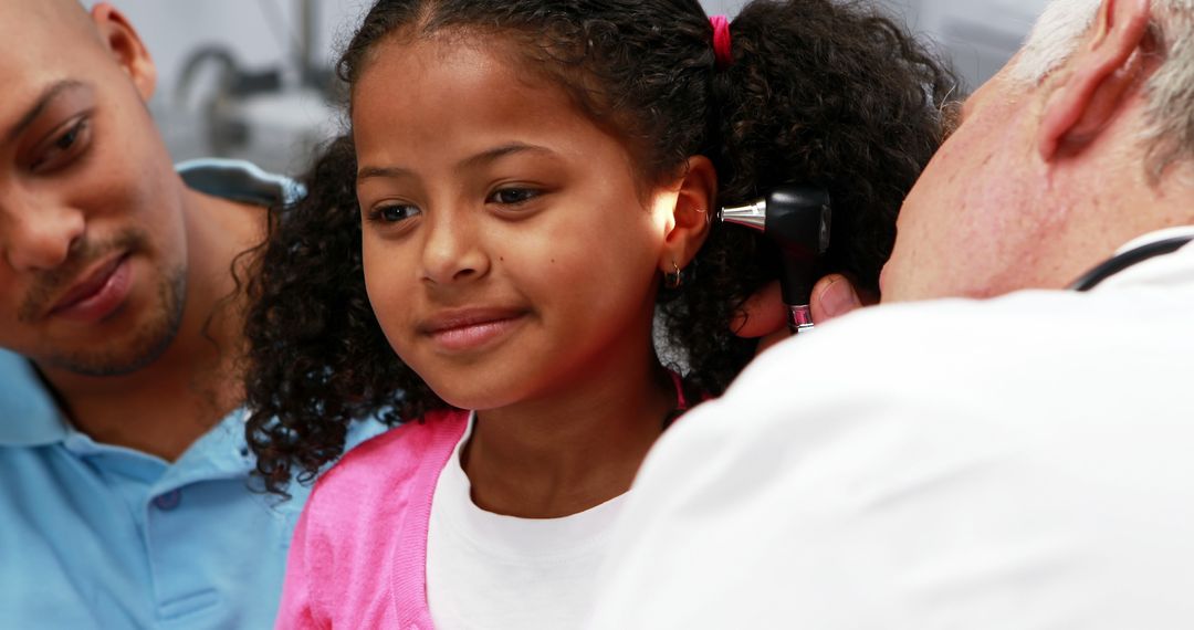 Young Girl Receiving Ear Examination by Doctor - Free Images, Stock Photos and Pictures on Pikwizard.com