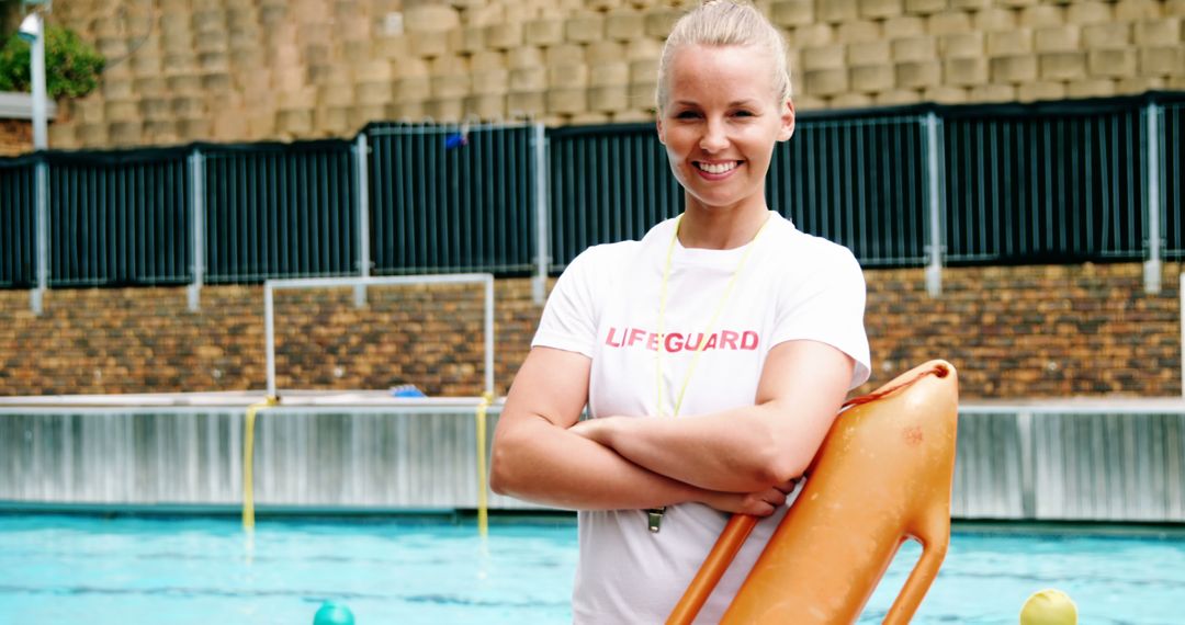 Vigilant Lifeguard with Rescue Tube by Poolside