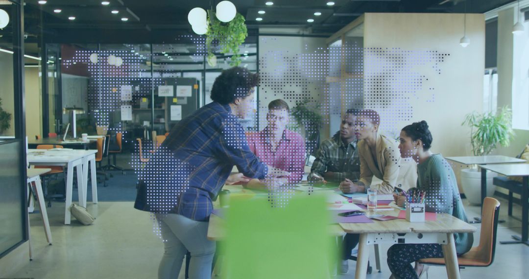 Dynamic Team Meeting in Modern Open-plan Office Environment