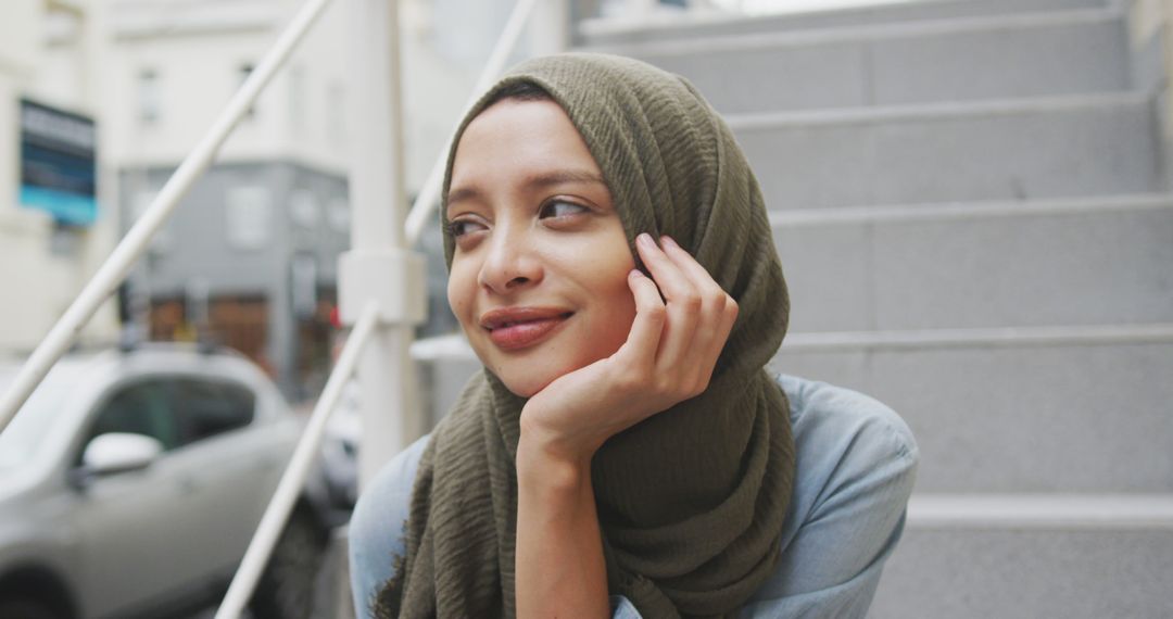 Smiling Young Woman with Hijab in Urban Environment - Free Images, Stock Photos and Pictures on Pikwizard.com