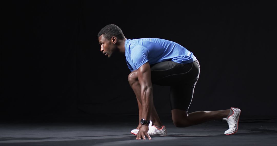 Athlete Ready to Sprint on Track with Determination