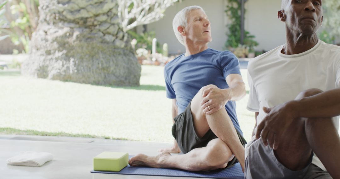 Senior Men Practicing Yoga Outdoors in Relaxing Setting - Free Images, Stock Photos and Pictures on Pikwizard.com