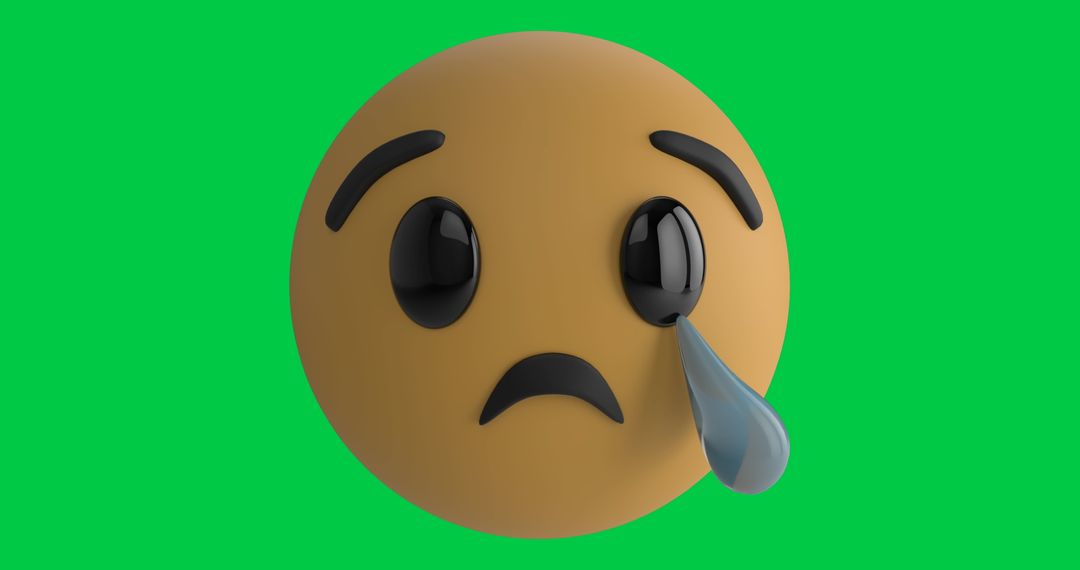 Sad Emoji Tear Expression with Green Background Close-Up