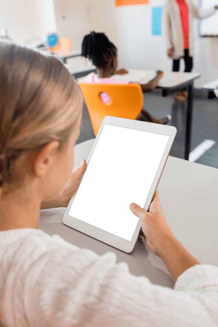 Girl Using Transparent Screen Tablet in Modern Classroom Setting
