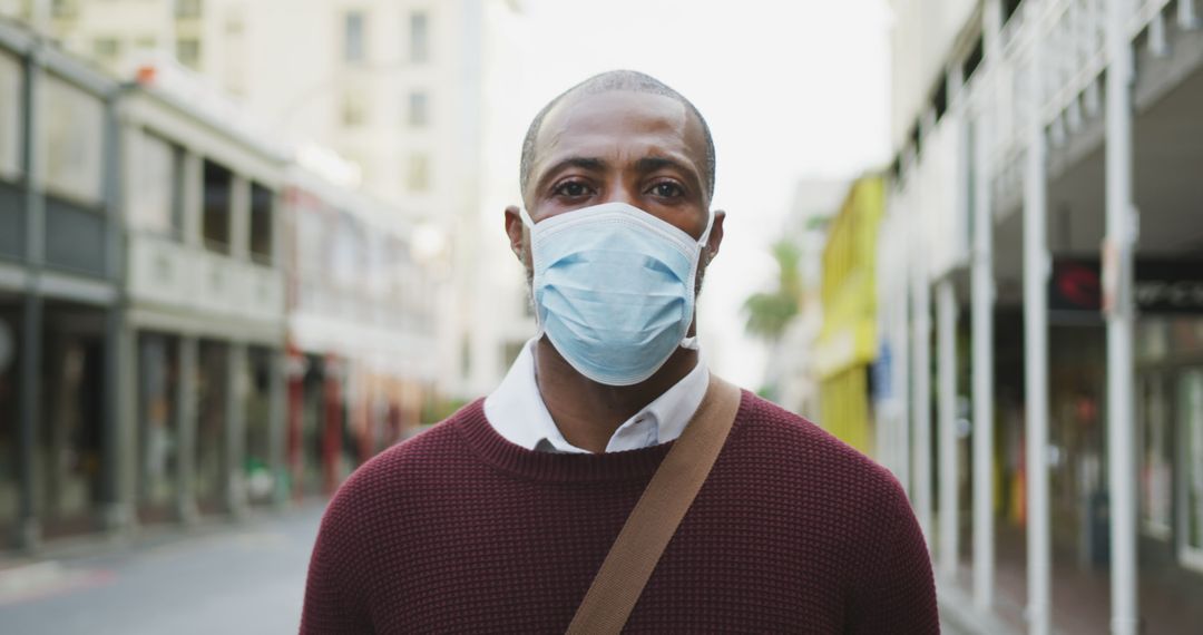 Man Wearing Face Mask on City Street - Free Images, Stock Photos and Pictures on Pikwizard.com