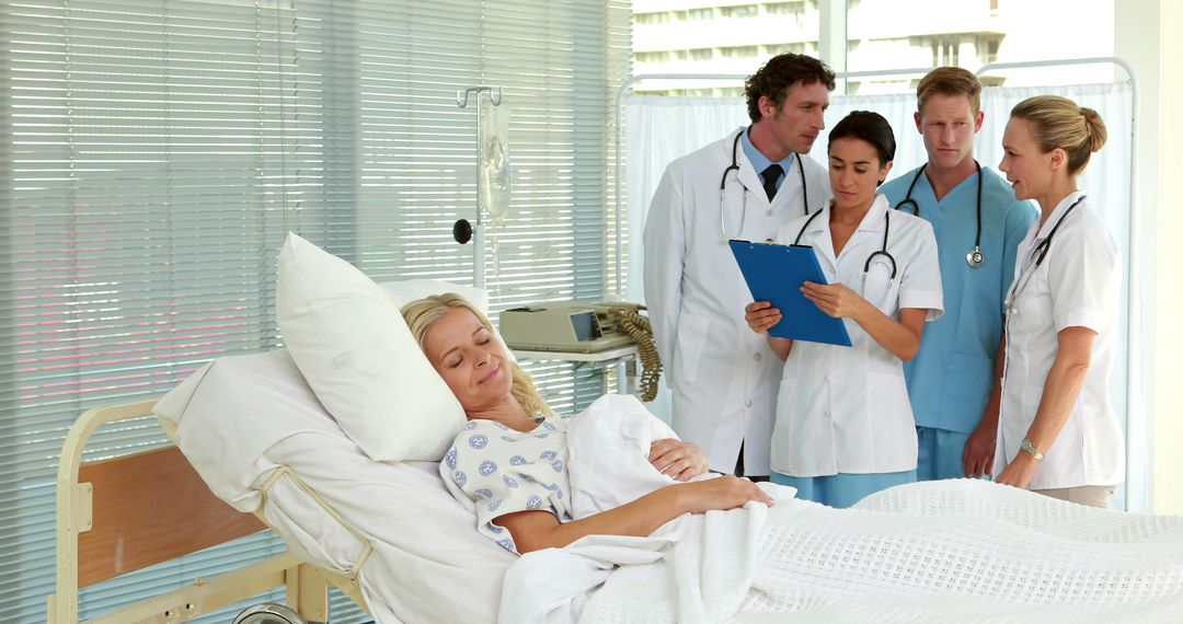 Medical professionals work together to treat a middle-aged female patient in a hospital. - Free Images, Stock Photos and Pictures on Pikwizard.com