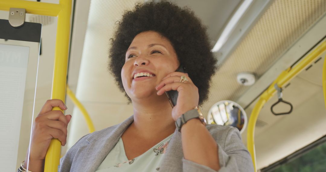 Smiling Plus Size Woman Talking on Smartphone in Public Bus