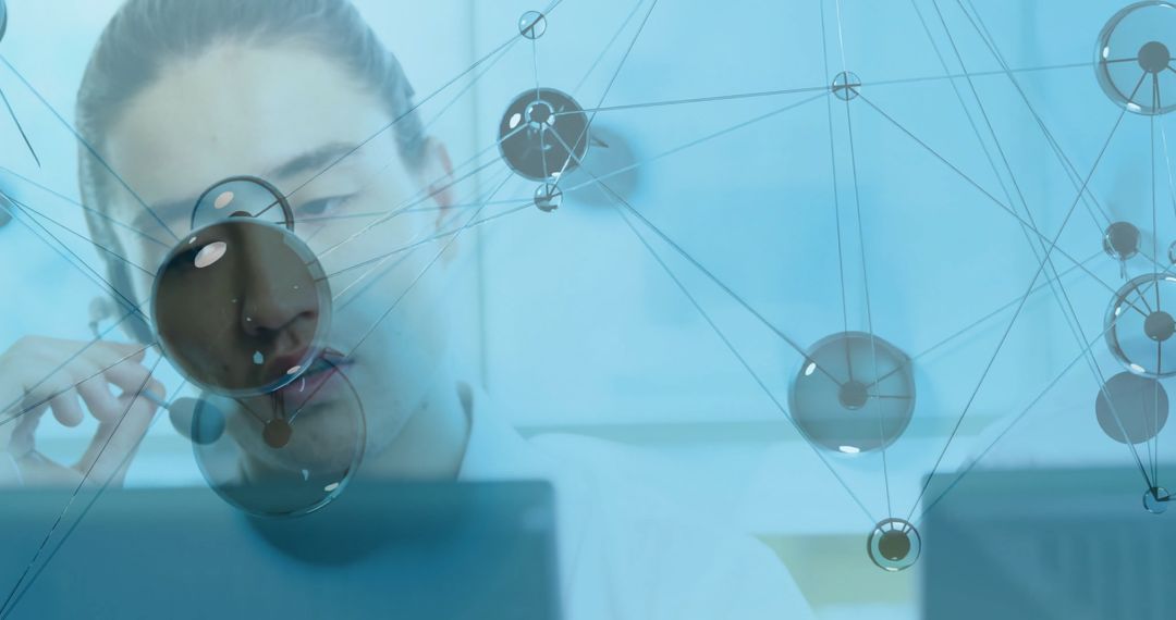 Professional Analyzing Data on Computer with Network Graphic Overlay