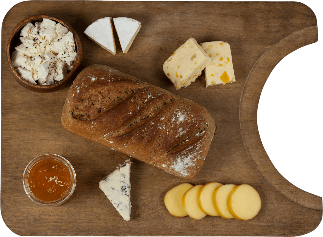 Fresh Artisan Bread and Diverse Cheeses on Transparent Board