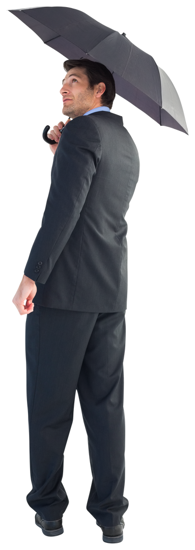 Businessman looking up and smiling while holding black transparent umbrella - Download Free Stock Images Pikwizard.com