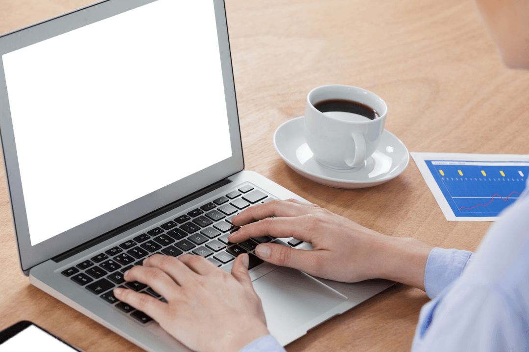 Professional Businesswoman Working on Laptop with Coffee