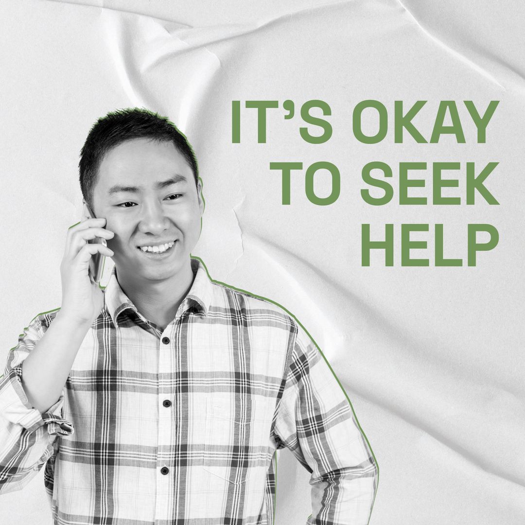 Smiling Man Talking on Smartphone Promoting Seeking Help