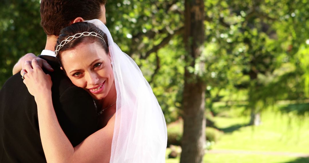 Joyful Bride Hugging Groom on Wedding Day - Free Images, Stock Photos and Pictures on Pikwizard.com