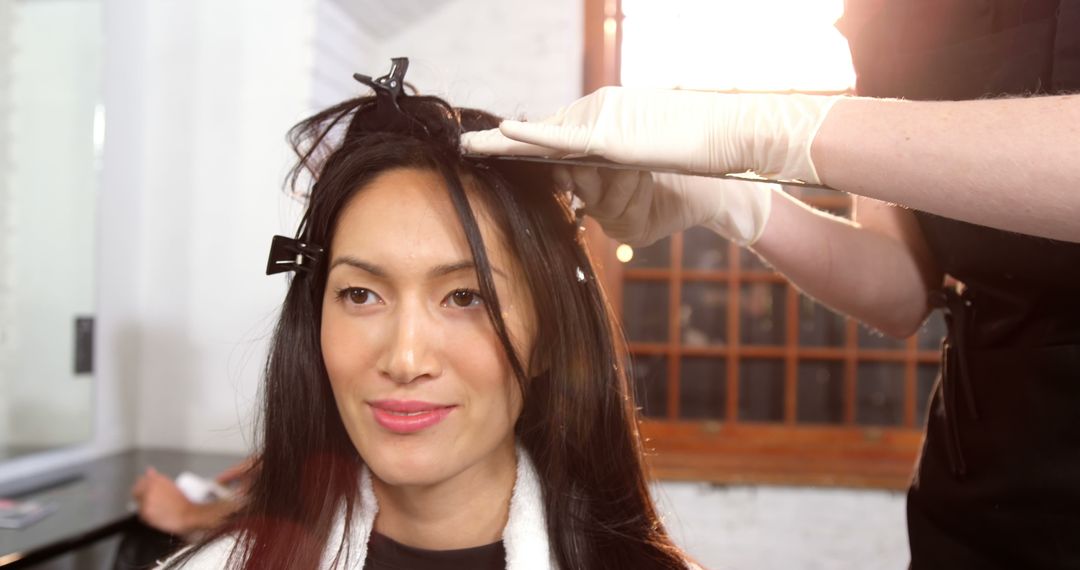 Woman Getting Hair Treatment in Salon - Free Images, Stock Photos and Pictures on Pikwizard.com