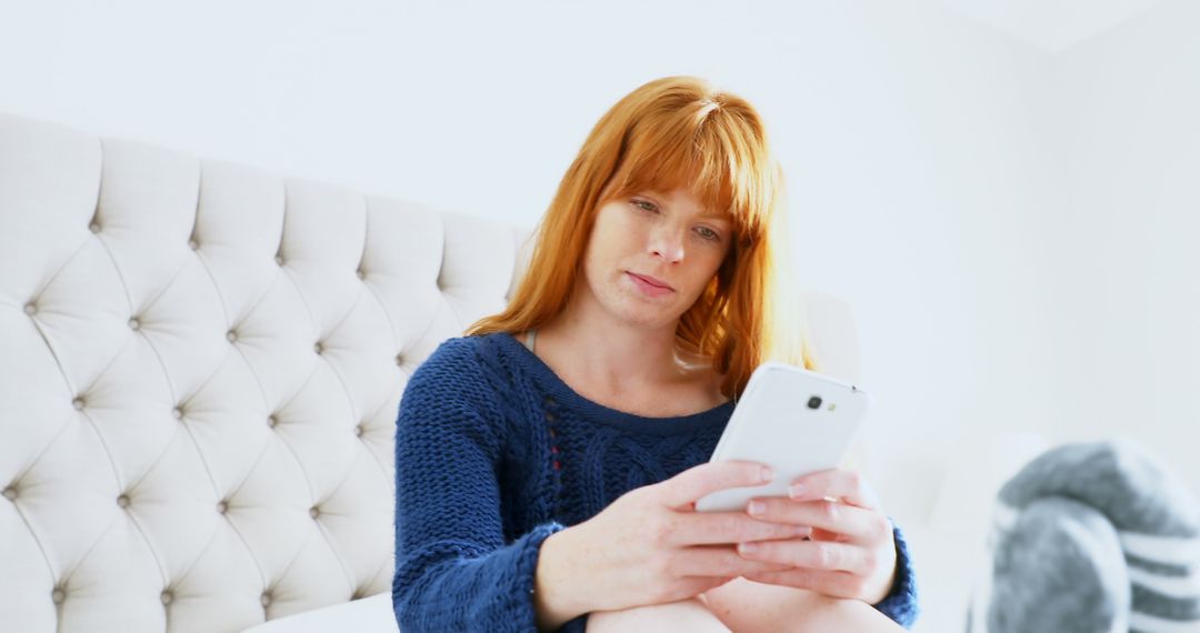 Relaxed Woman Using Smartphone on Bright Morning - Free Images, Stock Photos and Pictures on Pikwizard.com