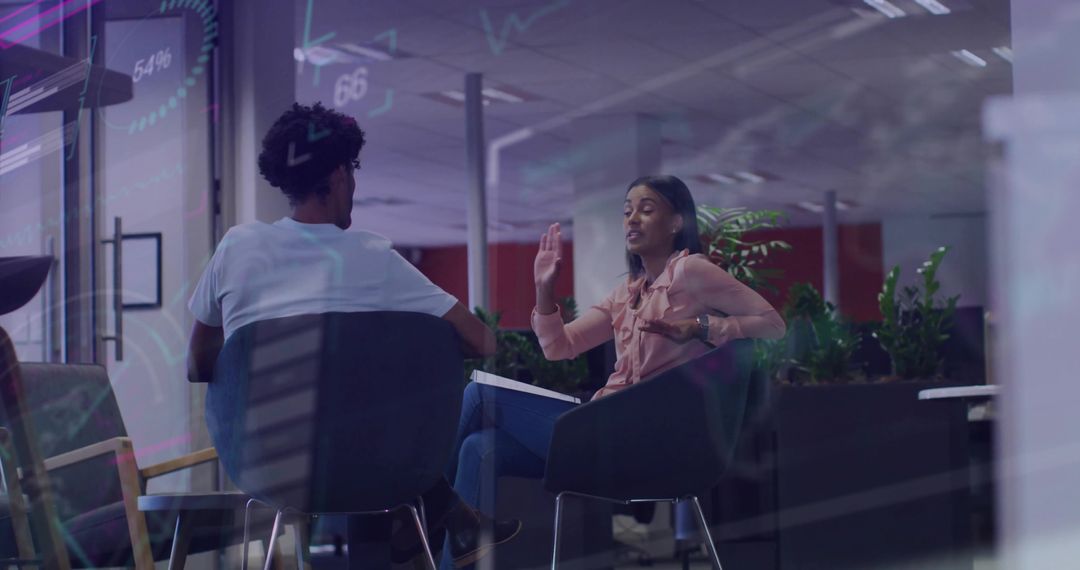 Colleagues Engaging in Intense Brainstorming Session with Data Visualization