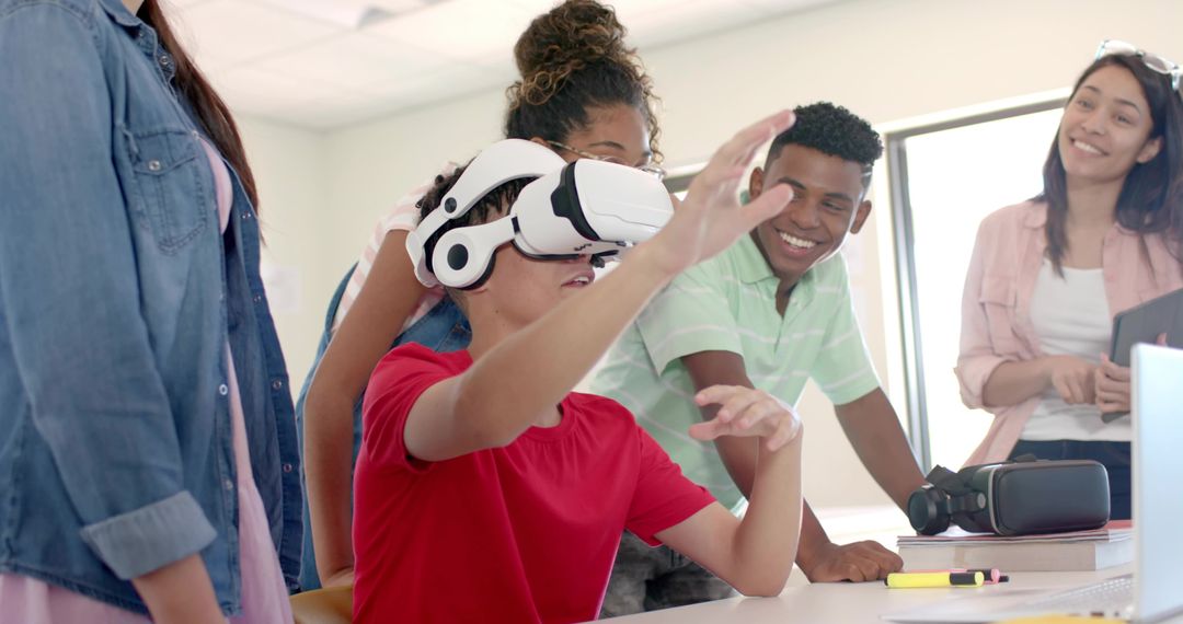 Teen Exploring Virtual Reality in Classroom with Peers and Instructor Smiling