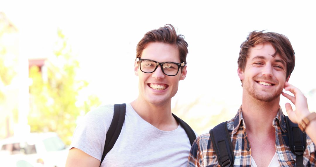 Cheerful Friends Strolling in Urban Environment