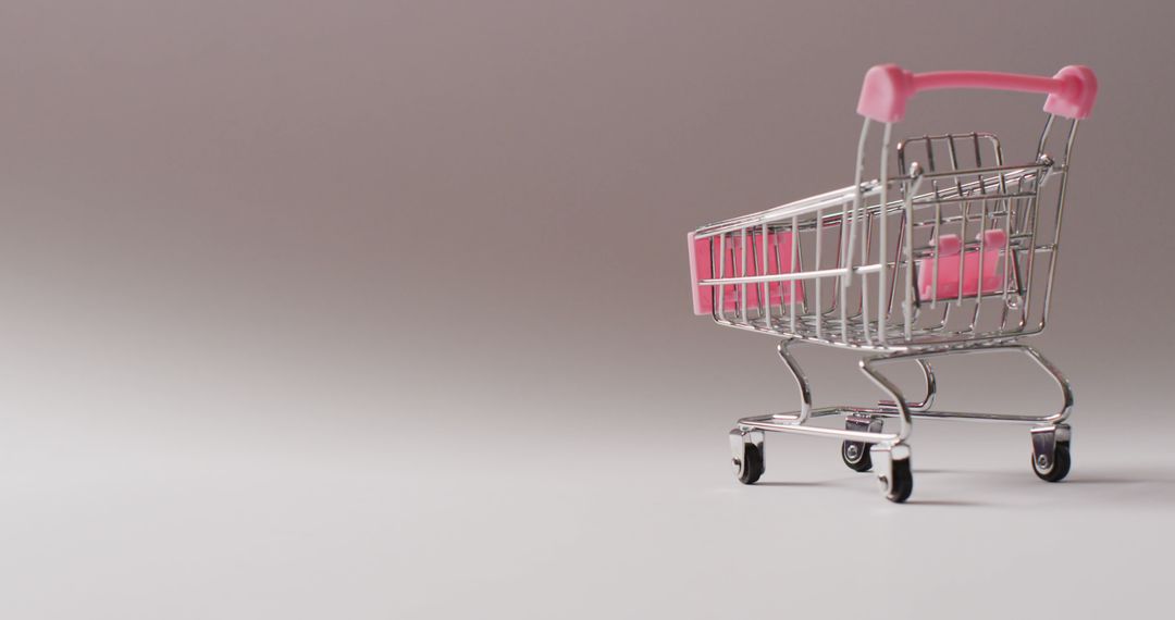 Empty Shopping Cart with Pink Handle on Gradient Background - Free Images, Stock Photos and Pictures on Pikwizard.com