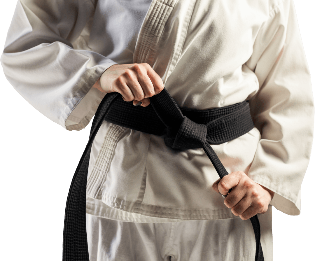 Karate Fighter Tying Black Belt Showing Expertise