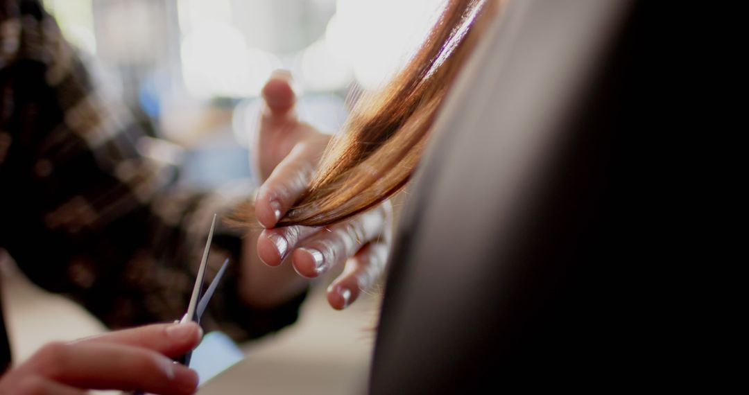 Close-up of Hairdresser Cutting Long Brunette Hair in Salon - Free Images, Stock Photos and Pictures on Pikwizard.com