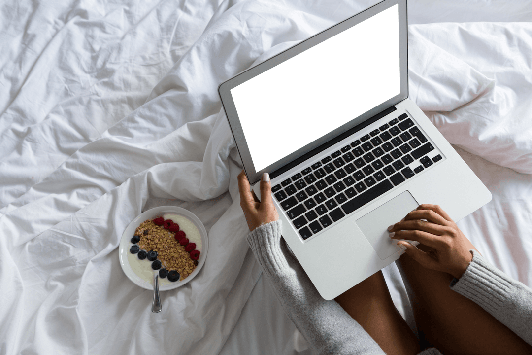 Relaxed Day at Home: Woman's Hands on Laptop Displayed Transparently