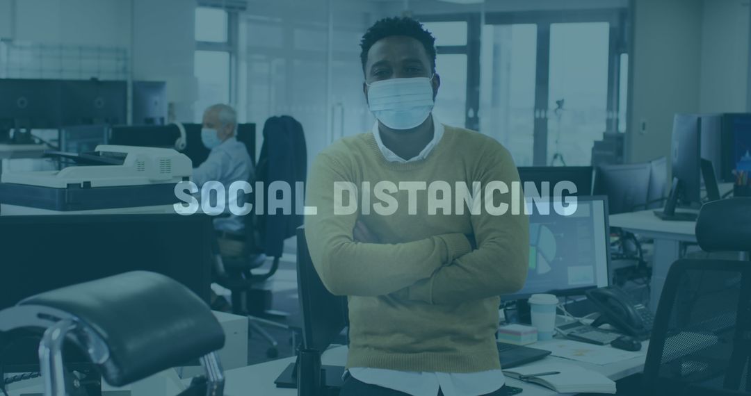 Office Workers Practicing Social Distancing While Wearing Masks