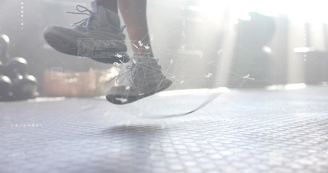 Athletic Man Jumping Rope with Digital Overlay in Gym