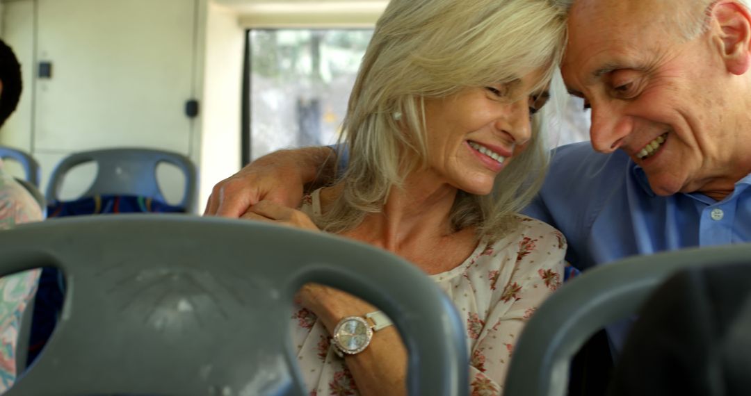 Senior Couple Smiling and Connecting While Riding Bus - Free Images, Stock Photos and Pictures on Pikwizard.com