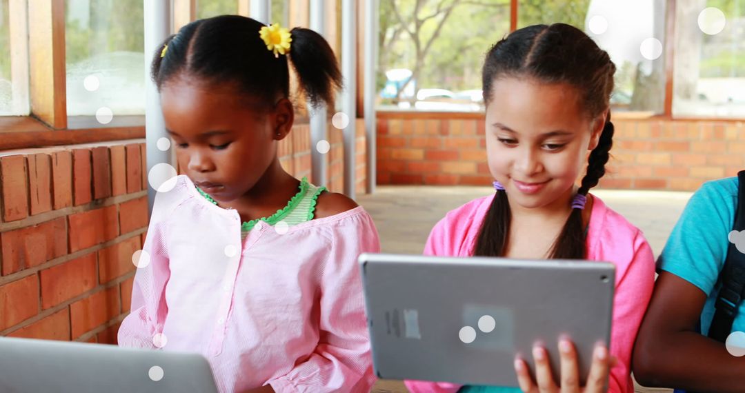Diverse Girls Using Tablets Sparks Innovative Learning