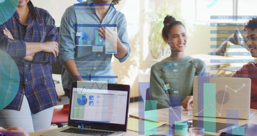 Cheerful Diverse Team Collaborating in Modern Office with Data Infographics