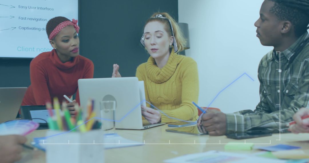 Diverse Team Collaborating on Innovative Tech Presentation