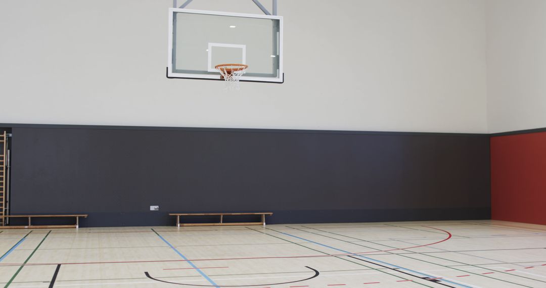 Indoor Basketball Court with Wooden Floor and Hoop - Free Images, Stock Photos and Pictures on Pikwizard.com