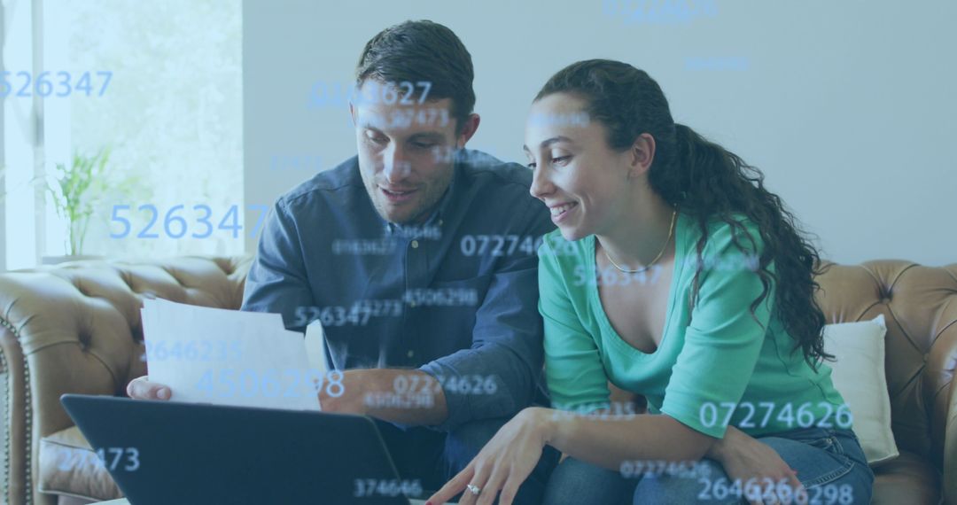 Caucasian Couple Analyzing Data on Laptop