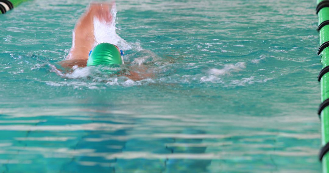 Competitive Swimmer Practicing Lap in Pool - Free Images, Stock Photos and Pictures on Pikwizard.com