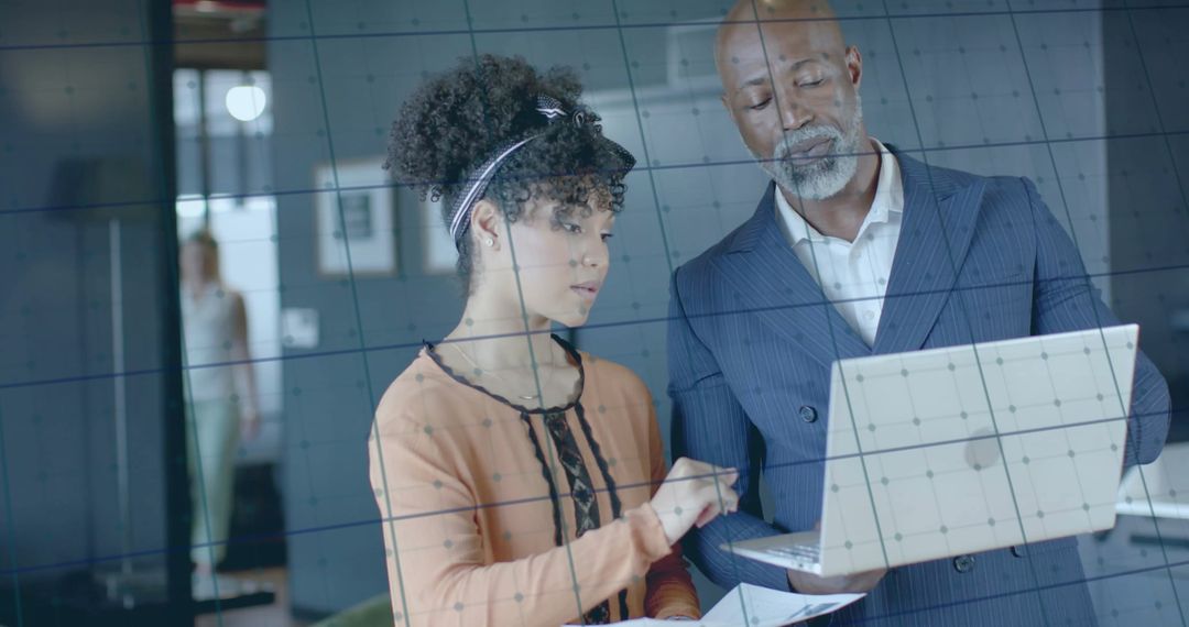 Diverse Team Collaborates on Financial Data with Technology