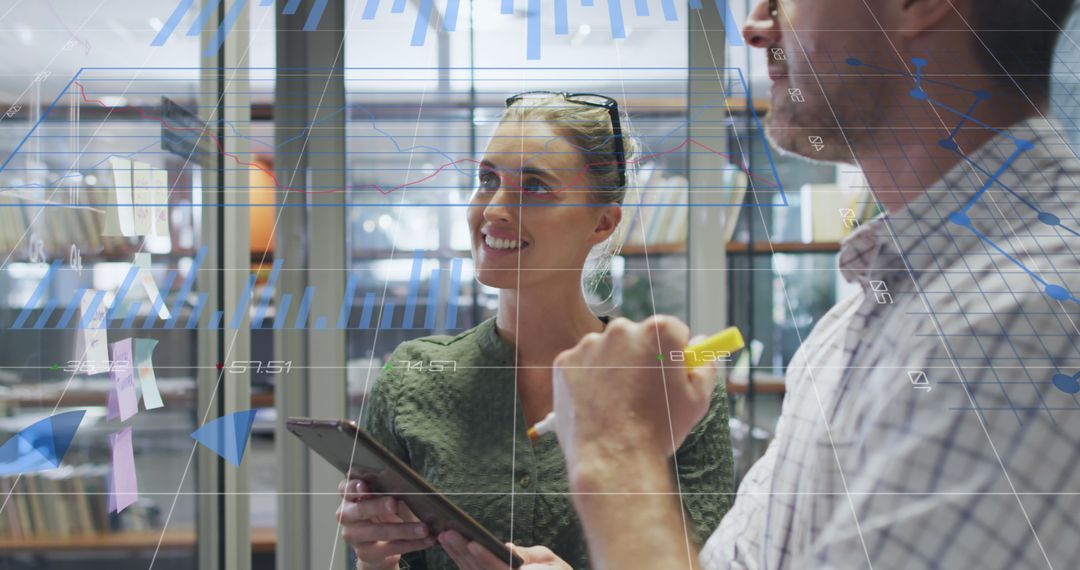 Caucasian Professionals Collaborating in Tech-Driven Office