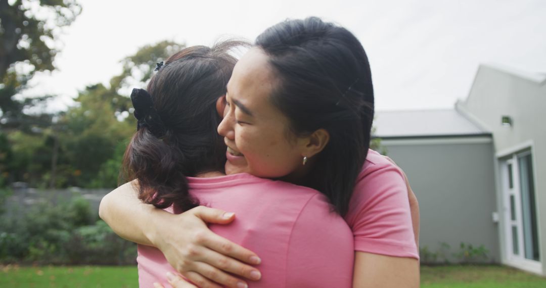 Two Women Hugging Outdoors, Showing Support and Friendship - Free Images, Stock Photos and Pictures on Pikwizard.com