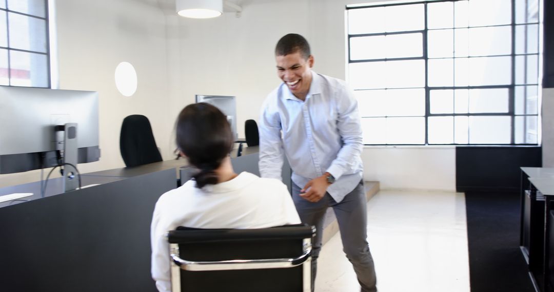 Playful Business Colleagues Engaging in Office Fun