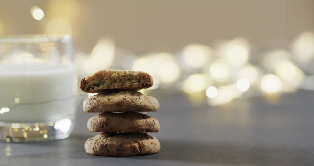 Stack of Cookies with Milk in Cozy Lighted Ambiance
