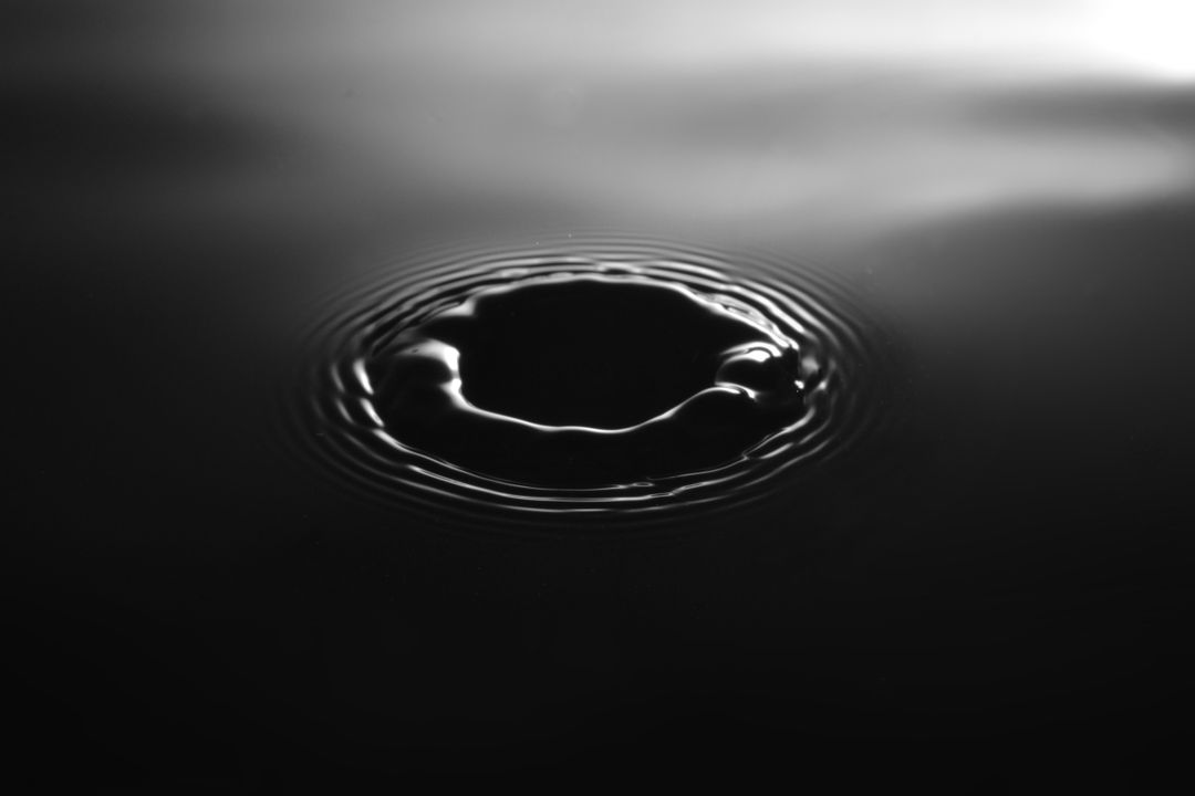 Abstract Water Ripple Pattern on Black Background - Free Images, Stock Photos and Pictures on Pikwizard.com