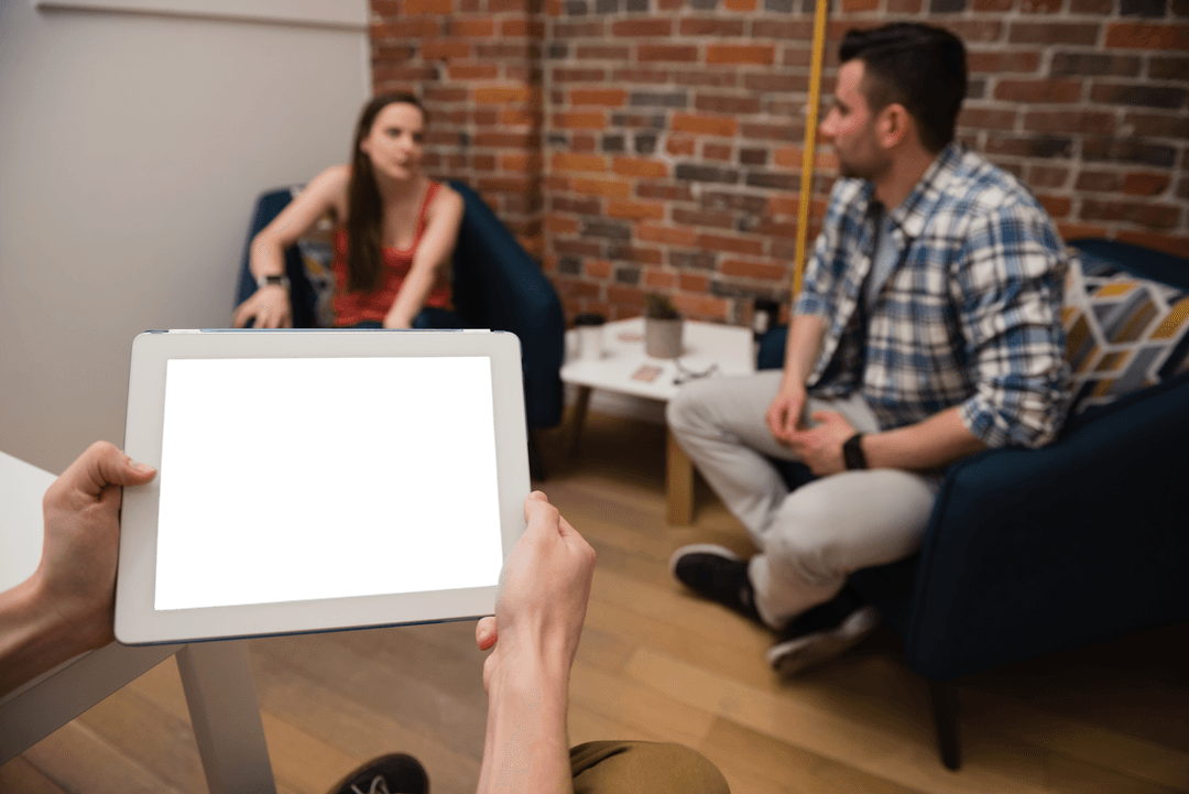 Transparent Tablet Screen and Conversation Between Colleagues